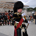Piper outide Scottish Holyrood Parliament