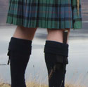 Ken Hanley in a kilt overlooking Skye