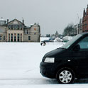 Small World Tours van at St Andrews in the snow